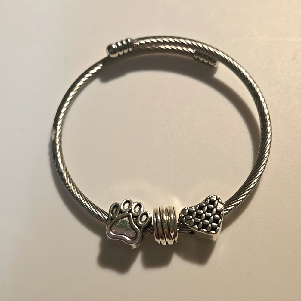 Hand crafted charm bracelet that wraps around wrist. N199